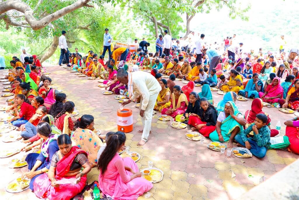 Villagers Having Food At Program Arranged By Kute Group Foundation