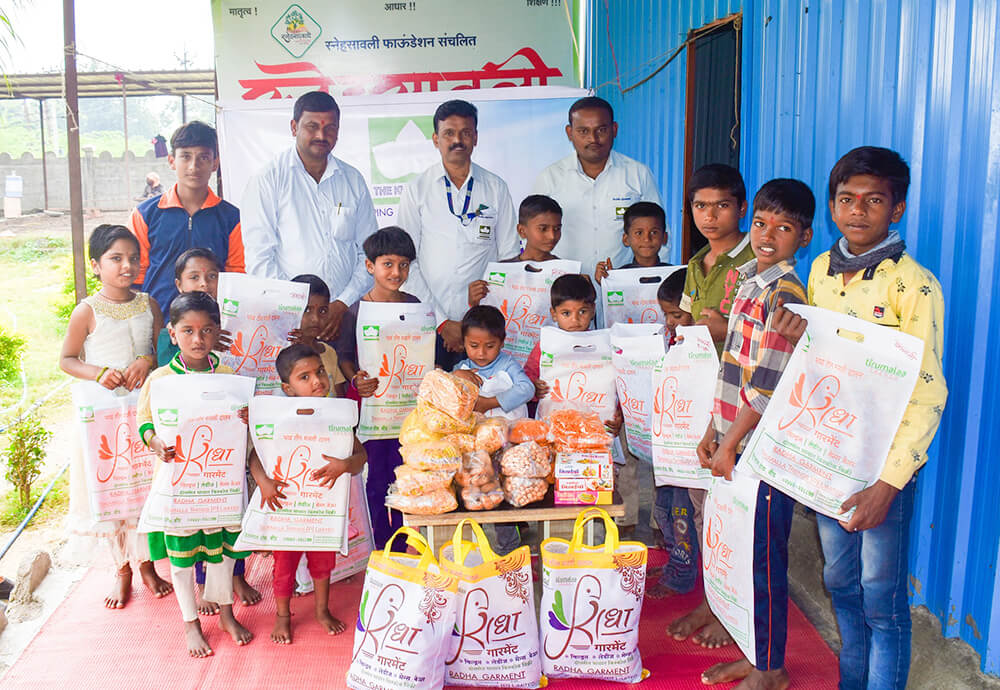 kute group foundation distributing clothes at Sneha Savali Orphanage