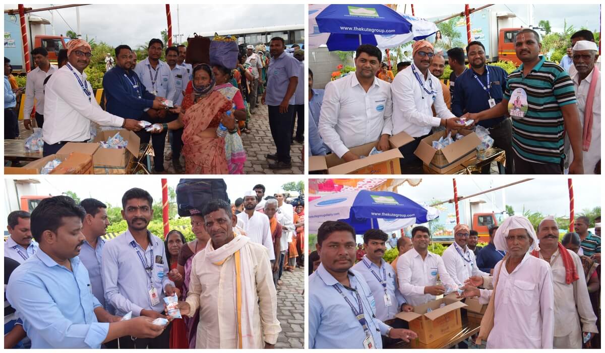 Kute Group Foundation distributing snacks to devotees at phaltan