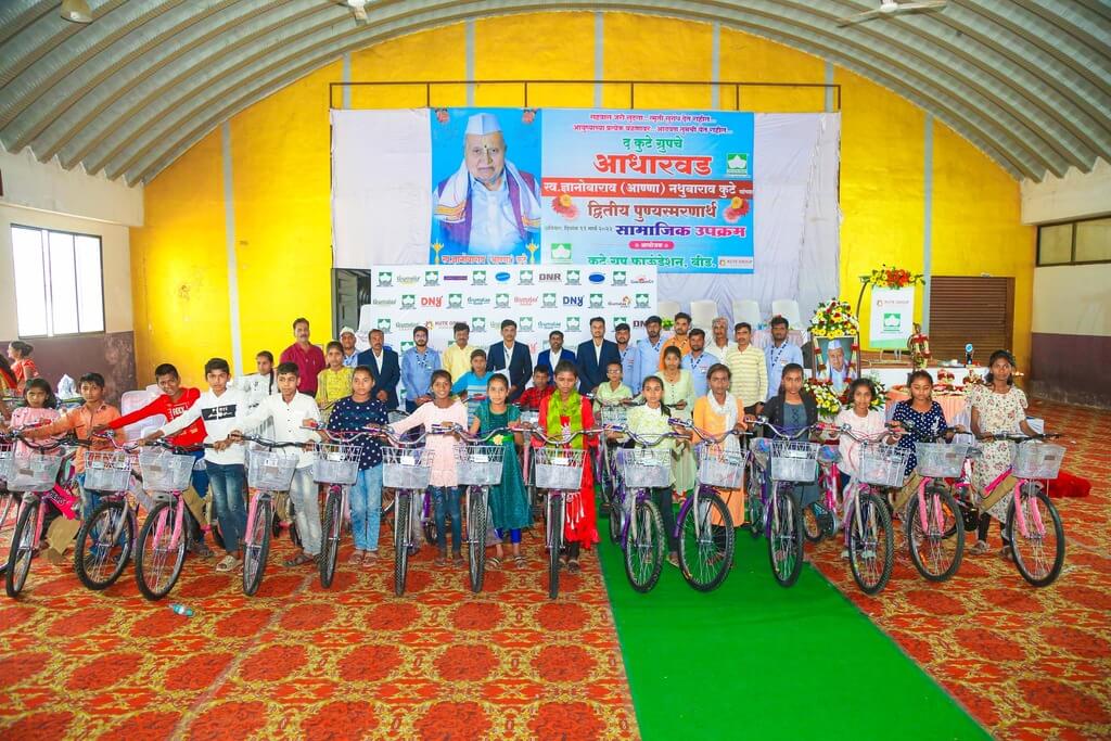 kute group foundation distributing bicycles to children